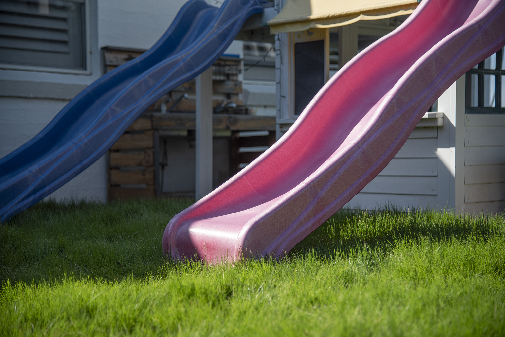 Slides over lush green natural turf